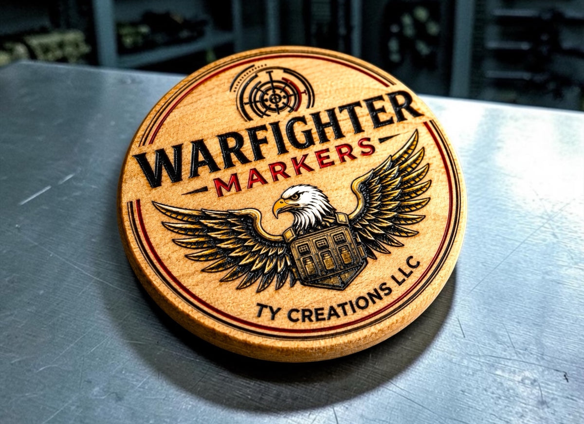 Wood coin laying on steel table with engraved and colored logo engraved.